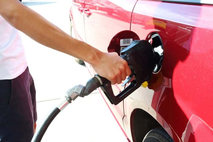 hand pumping gas