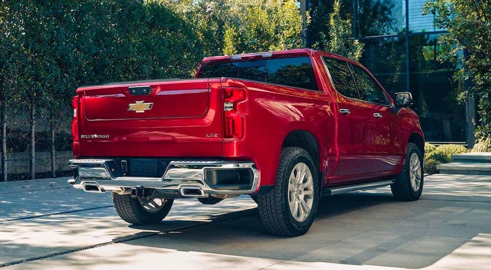 Rear end of red 2023 Chevy Silverado 1500 LTZ.