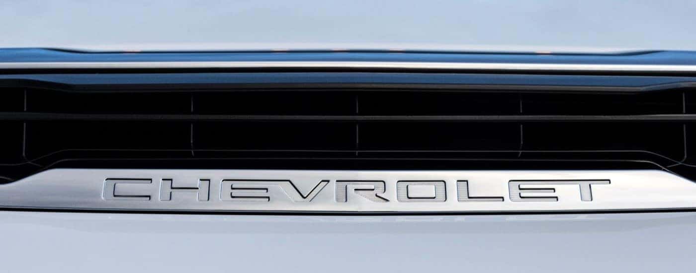 A close-up on the vent of a white 2024 Chevy Silverado 3500HD LTZ.