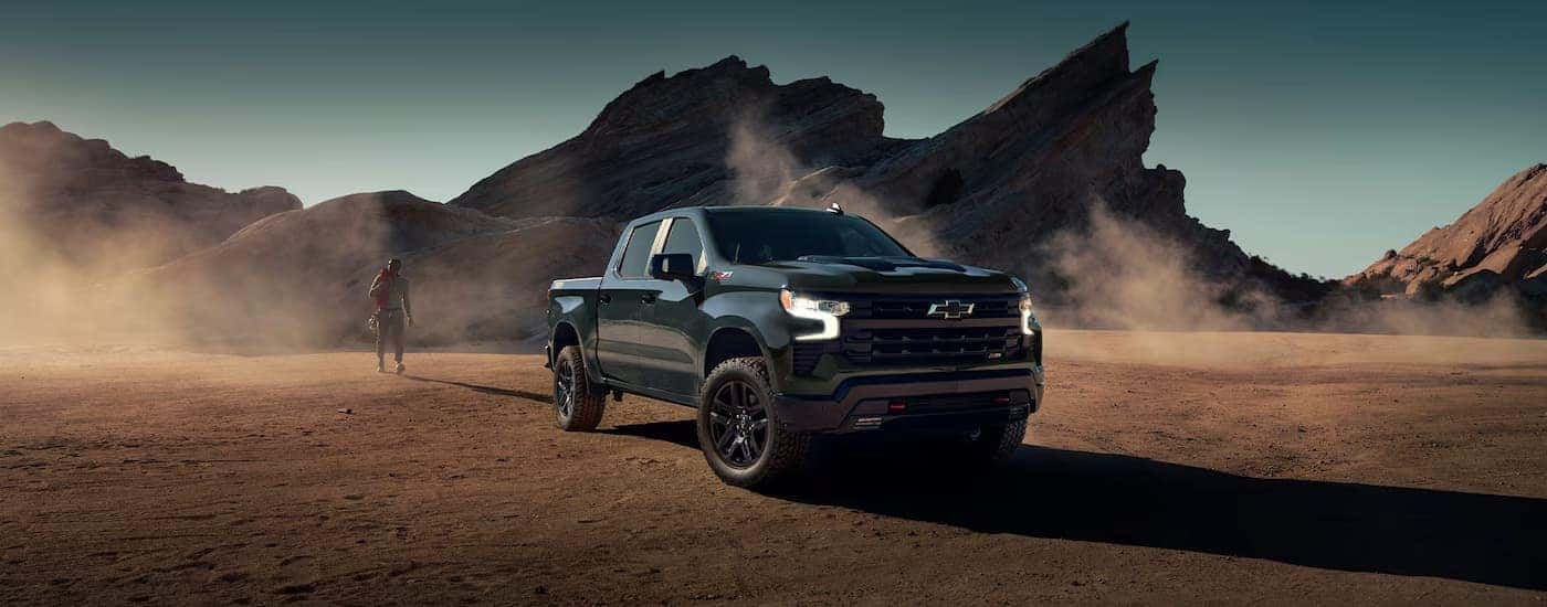 A black 2025 Chevy Silverado 1500 Z71 parked in the desert.