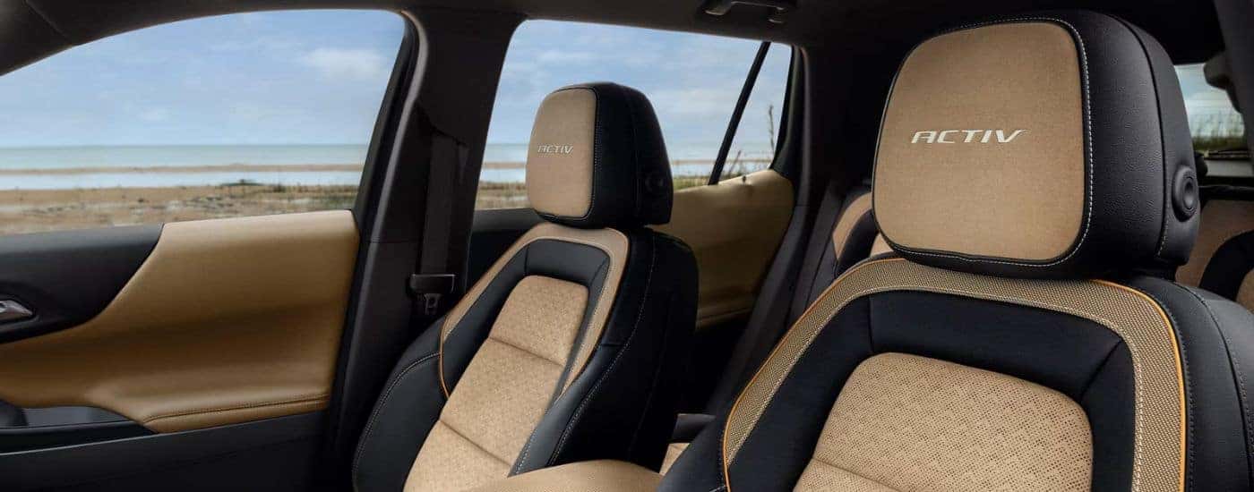 Black and tan interior of a 2025 Chevy Equinox ACTIV for sale near Boiling Springs