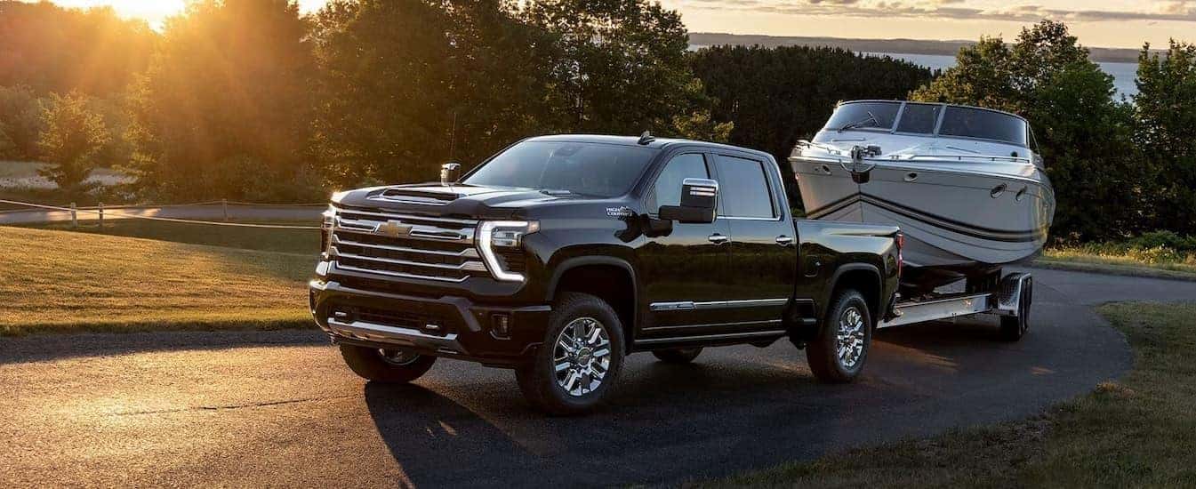 A black 2025 Chevy Silverado 2500 from the front at an angle.
