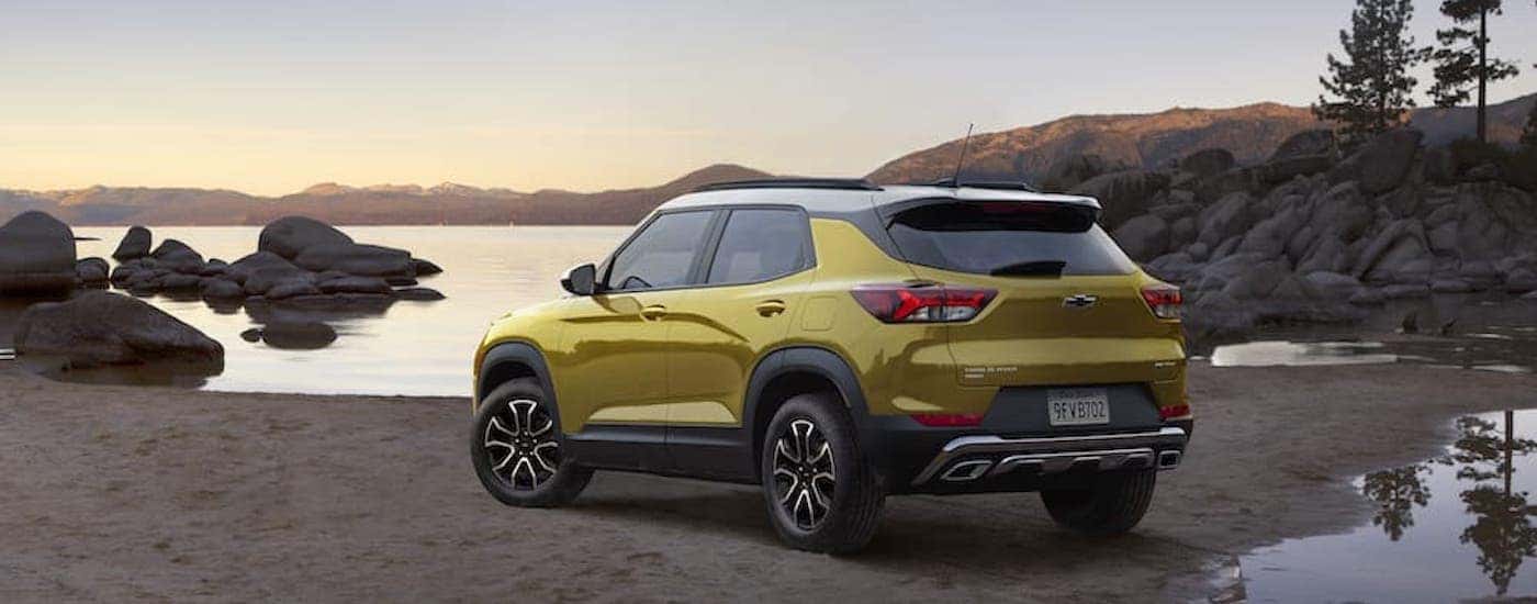 A yellow 2023 Chevy Trailblazer from the rear at an angle.