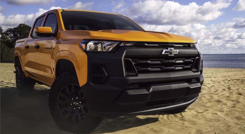 A yellow 2026 Chevy Colorado parked after viewing trucks for sale.