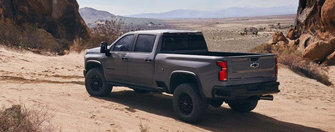 A gray 2025 Chevy Silverado 2500 ZR2 parked off-road.