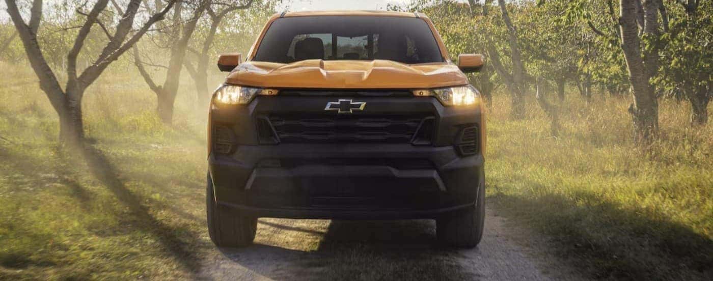 A yellow 2026 Chevy Colorado off-roading.