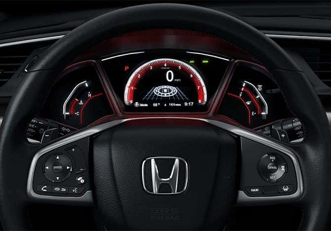 2020 Honda Civic Hatchback steering wheel controls & digital gauge.