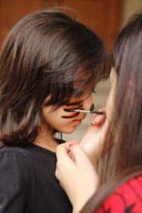 Girl getting face paint