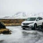 White honda suv on gray floor photo