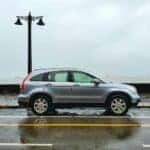 gray suv on gray asphalt road during daytime