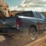 2023 honda ridgeline on an unpaved dirt road