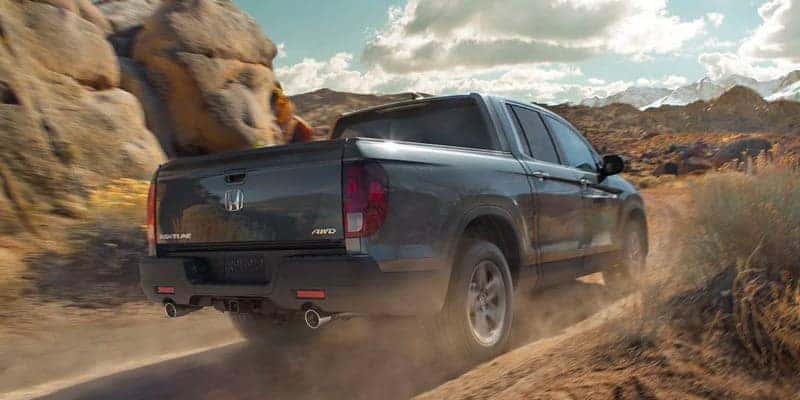2023 honda ridgeline on an unpaved dirt road