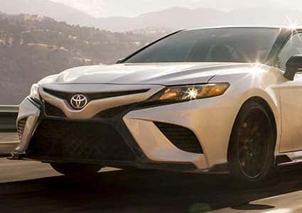 toyota vehicle driving in the mountains