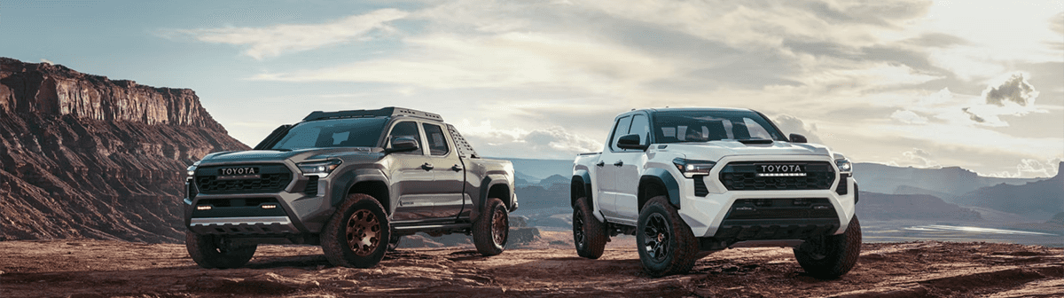 2025 Toyota Tacoma SR5 parked near Cincinnati skyline