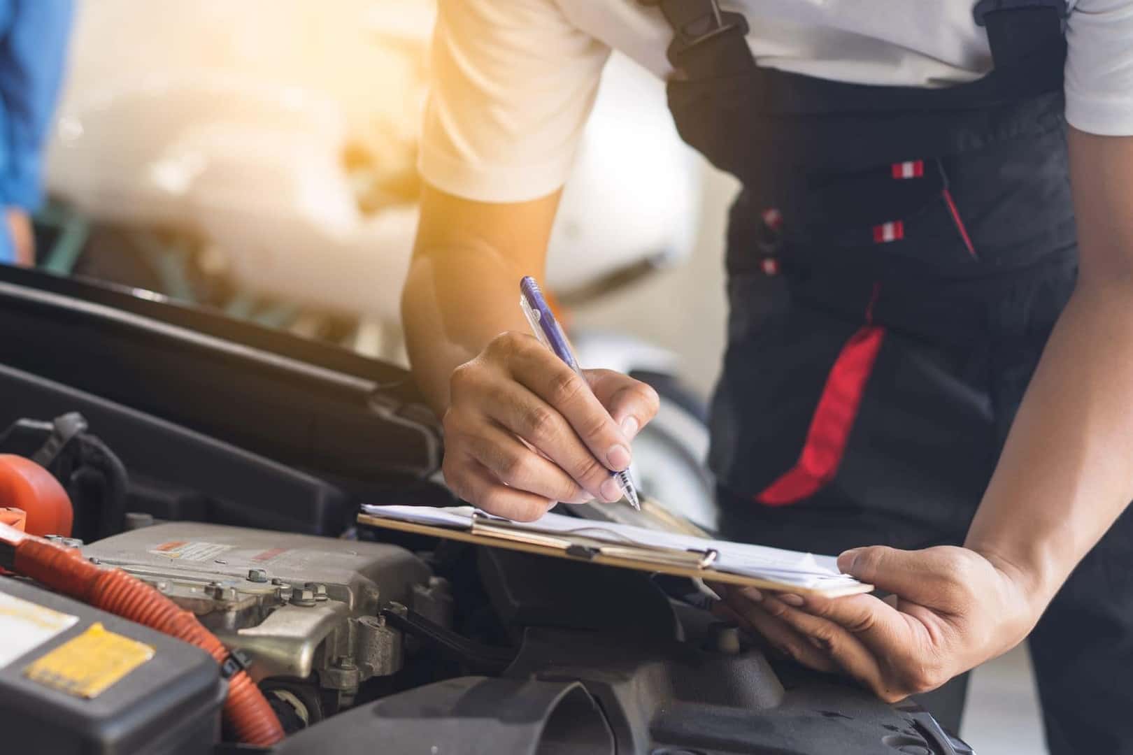 technician performing multi-point inspection