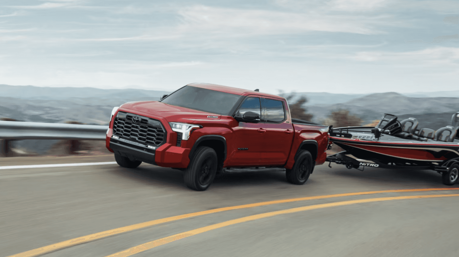 2025 Toyota Tundra shown in Supersonic Red* for sale at Price LeBlanc Toyota near me in Baton Rouge, LA.