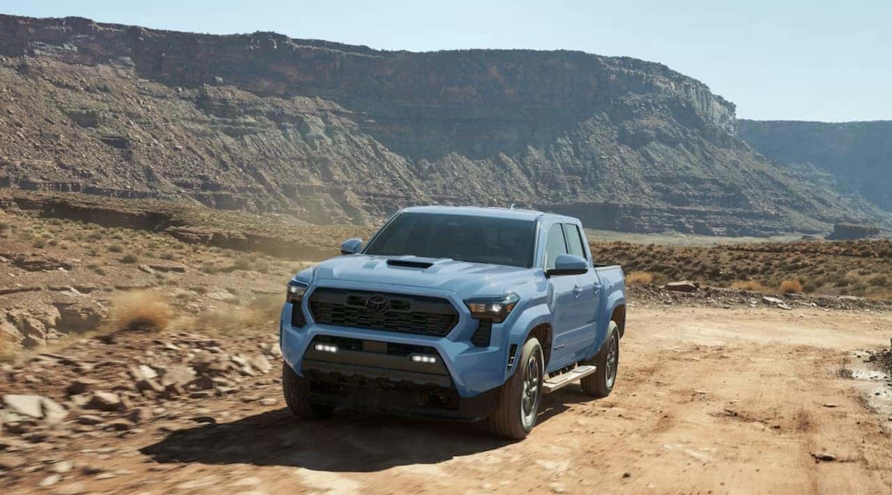 2026 Toyota Tacoma TRD Sport shown in Heritage Blue with available side step accessory for sale in Baton Rouge, LA