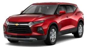 A red 2019 Chevy Blazer is facing left.