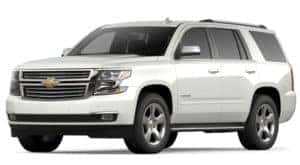 A white 2020 Chevy Tahoe is facing left.