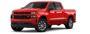 A red 2019 Chevy Silverado is facing left.