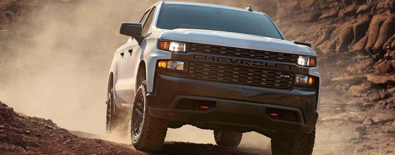 A white 2020 Chevy Silverado 1500 Trailboss is off-roading near Bethlehem. PA.