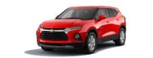 A red 2020 Chevy Blazer is facing left.