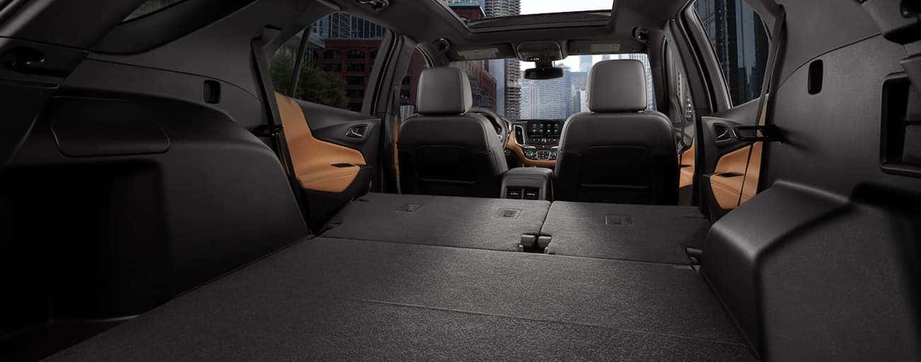 The rear seats are folded down in the back of a 2020 Chevy Equinox.