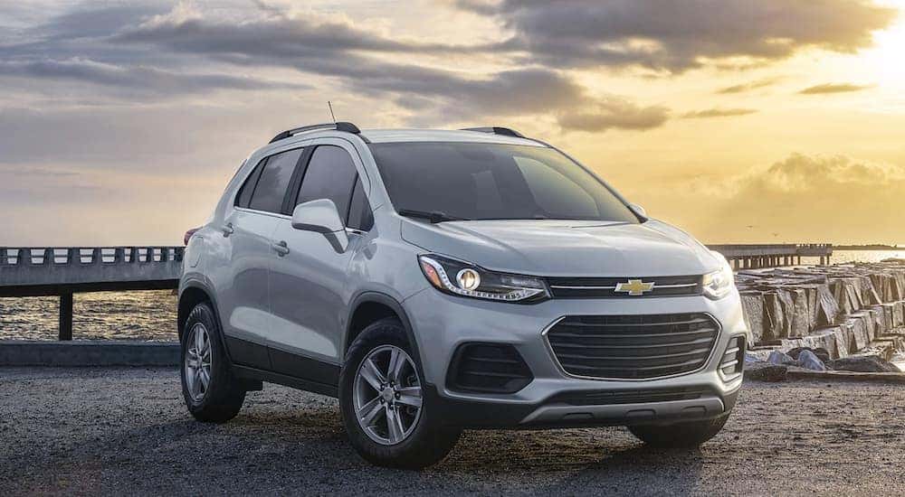 A silver 2021 Chevy Trax is parked at a pier.