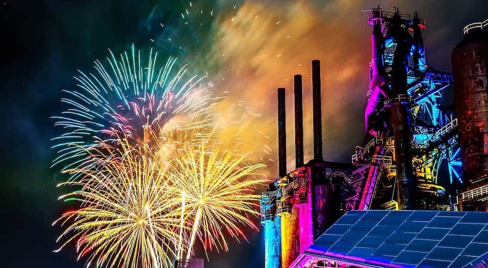 Fireworks are shown behind the steel stacks in Bethlehem at night.