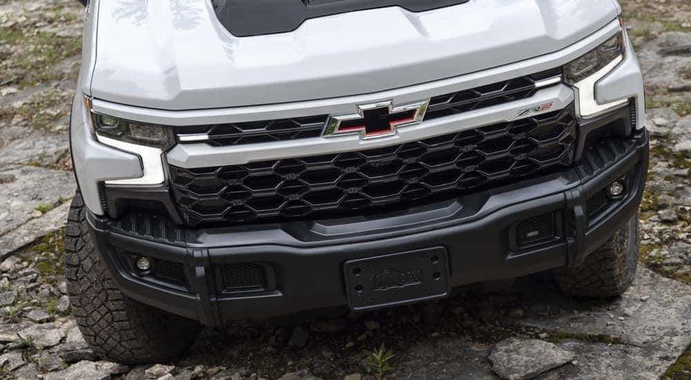 A close up of the front of a white 2023 Silverado 1500 ZR2 Bison is shown.