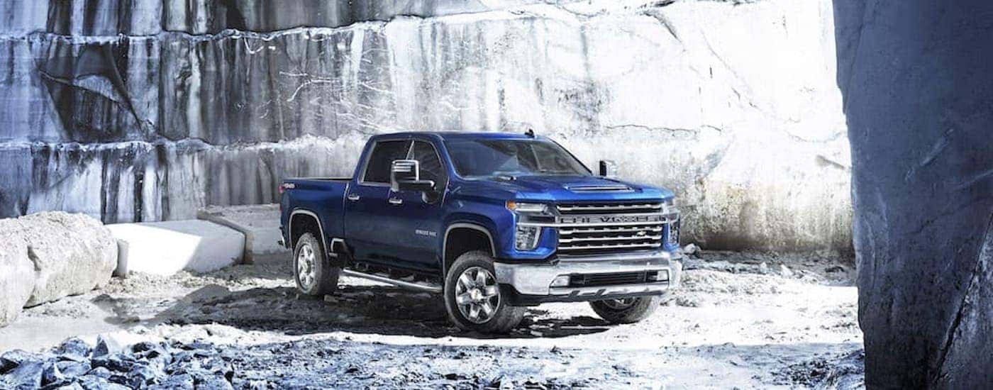 A blue 2022 Chevy Silverado 2500HD is shown from the front at an angle.
