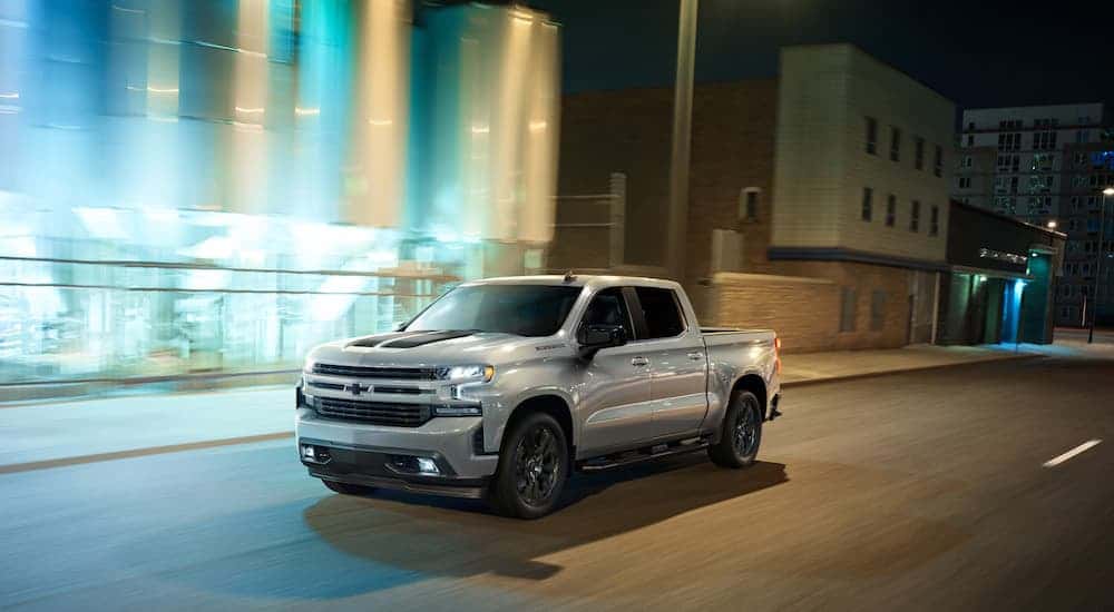 A silver 2023 Chevy Silverado 1500 RST is shown from the front at an angle.