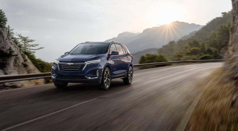 A blue 2022 Chevy Equinox is shown from the front at an angle.