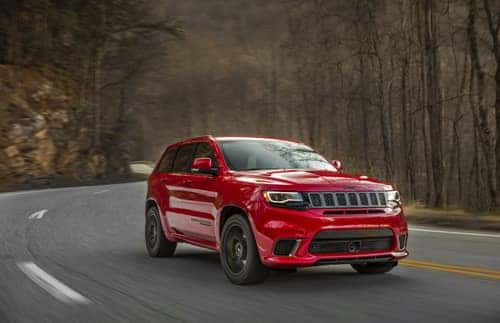 Jeep Grand Cherokee Red Driving