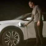 Man Charging Chrysler Airflow Concept EV