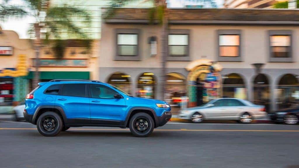Jeep Cherokee in town blue