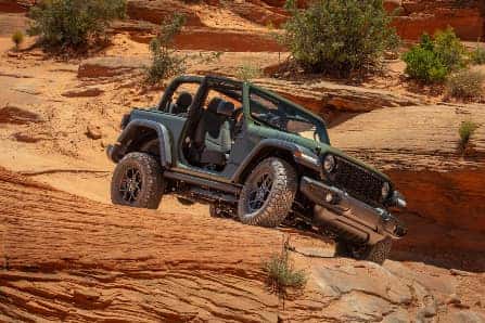 2024 Jeep Wrangler Willys Climbing on Rocks