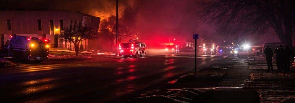 Fire Trucks on Street at Night
