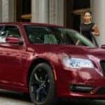 red chrysler 300 parked on street
