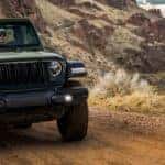 Front View of 2024 Jeep Wrangler in Mountainous Area