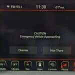 EMergency Vehicle Alert System stating "Caution Emergency Vehicle Approaching" on Uconnect Touchscreen