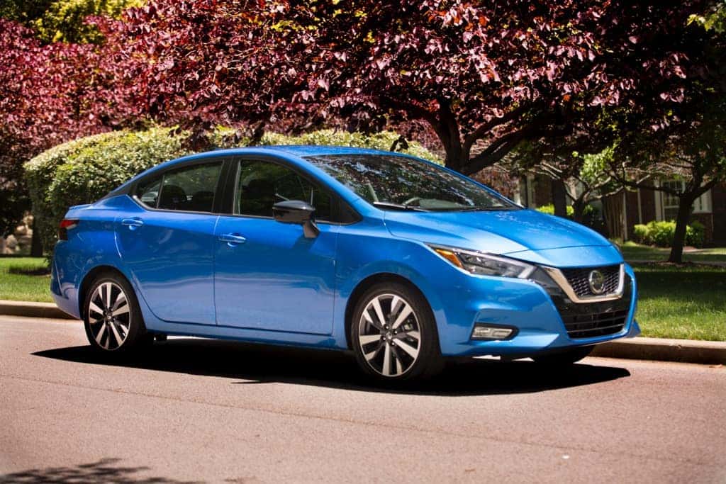 2020 Nissan Versa blue neighborhood street