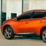 Side-Rear View of Orange 2023 Nissan Murano