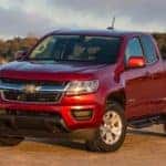 A red Chevy Colorado parked on a dirt parking lot near Buford, GA.