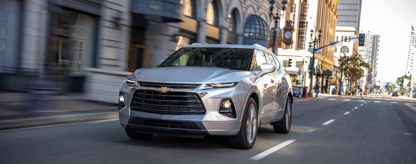 A gray 2019 Chevy Blazer driving near Buford, GA after leaving a local Chevrolet dealer.