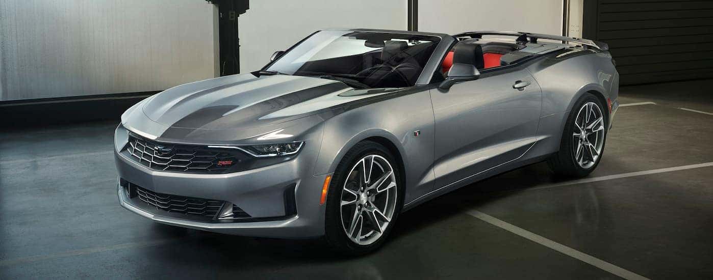 A grey 2019 Chevy Camaro is parked in a garage near Buford, GA.