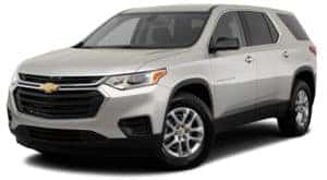 A silver 2019 Chevy Traverse is facing left.