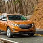 A 2019 Chevy Equinox driving on a paved backroad near Buford, GA.