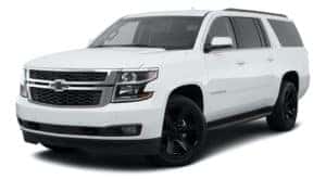 A white 2020 Chevy Suburban LT is angled left.
