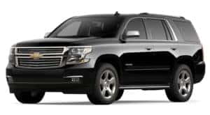 A black 2020 Chevy Tahoe is facing left.